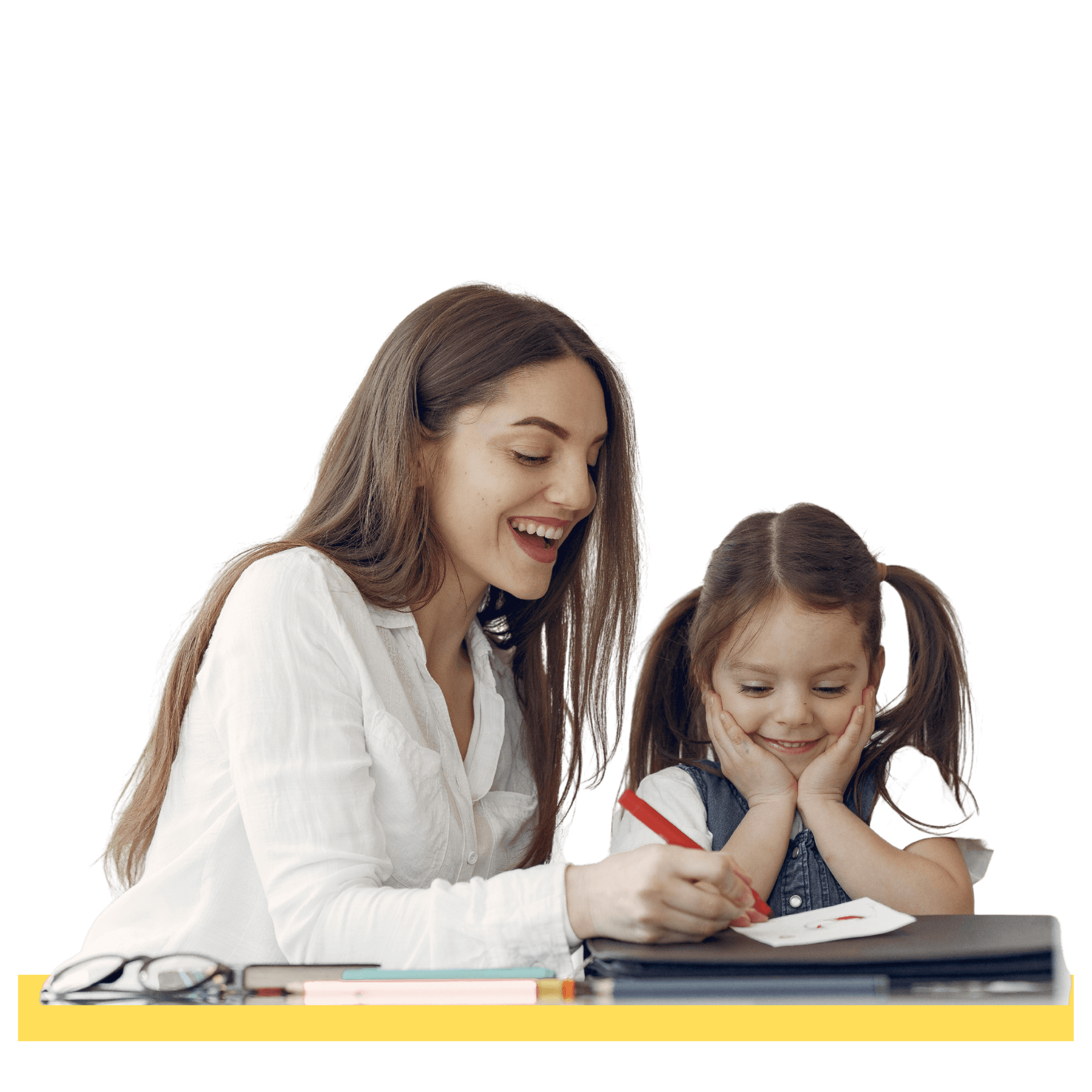 Teacher instructing a student while sitting at a desk